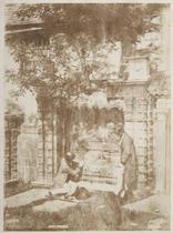 Nasmyth's (Naismith's) Tomb, Grayfriars ??? Edinburgh. View of the tomb, with two figures examing the monument: these have been identified as David Octavius Hill (1802-18700 seated on the ground point