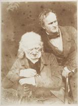 John Henning and A. H. Ritchie, sculptors. Half-length portrait. The older man, John Henning (1771-1851), is seated, his arms resting on a leather-bound volume. Alexander Handyside Ritchie (1804-1870)