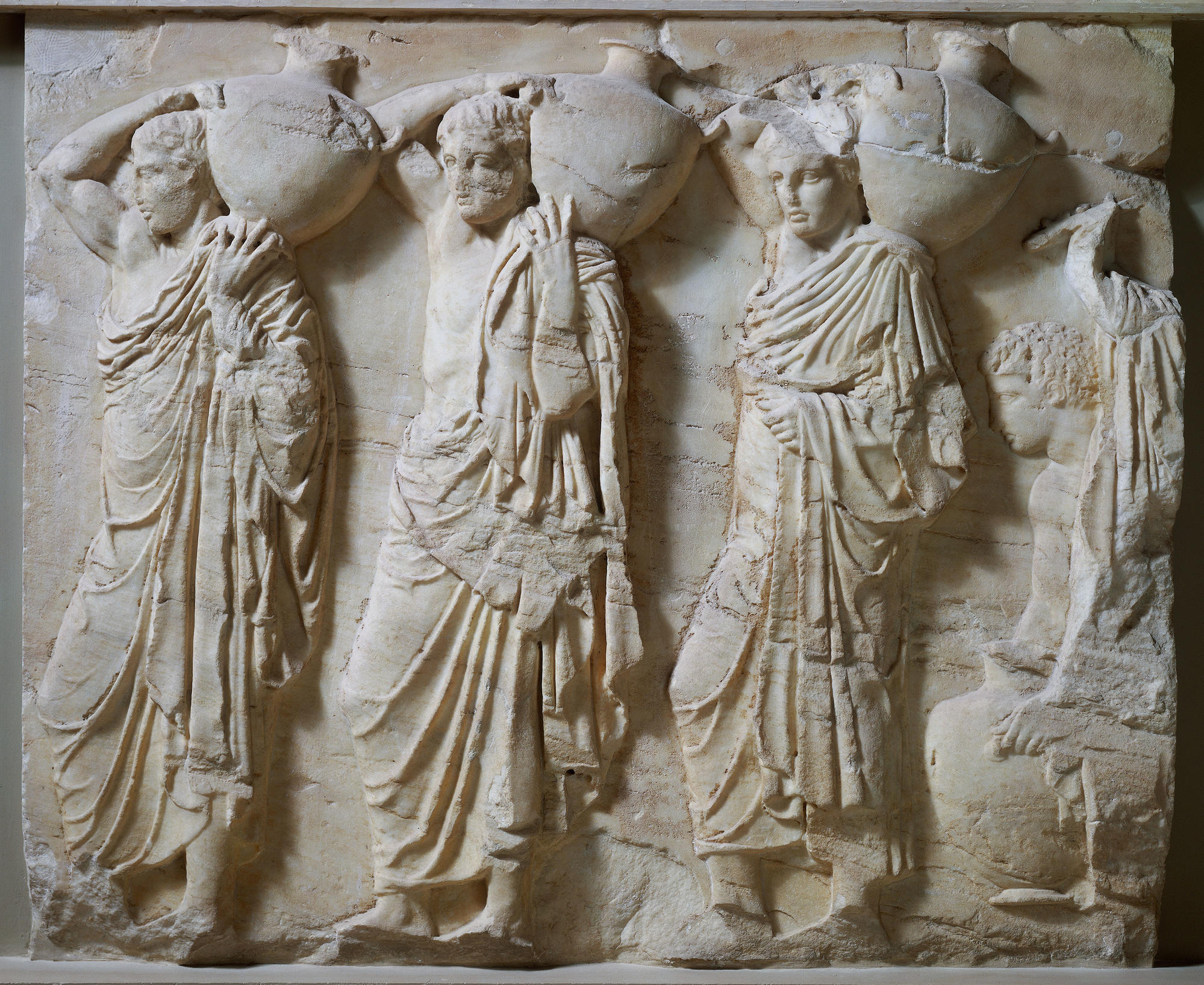 Women carrying water vessels. Frieze from the Parthenon.