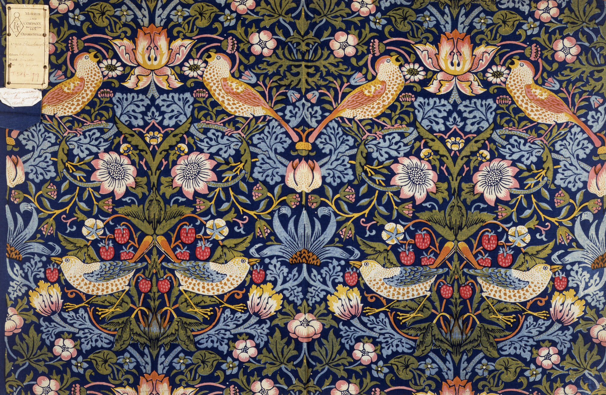 "Strawberry Thief," 1883. Indigo discharged and block-printed cotton, 60.5 x 95.2 cm, Inv. T.586-1919.
